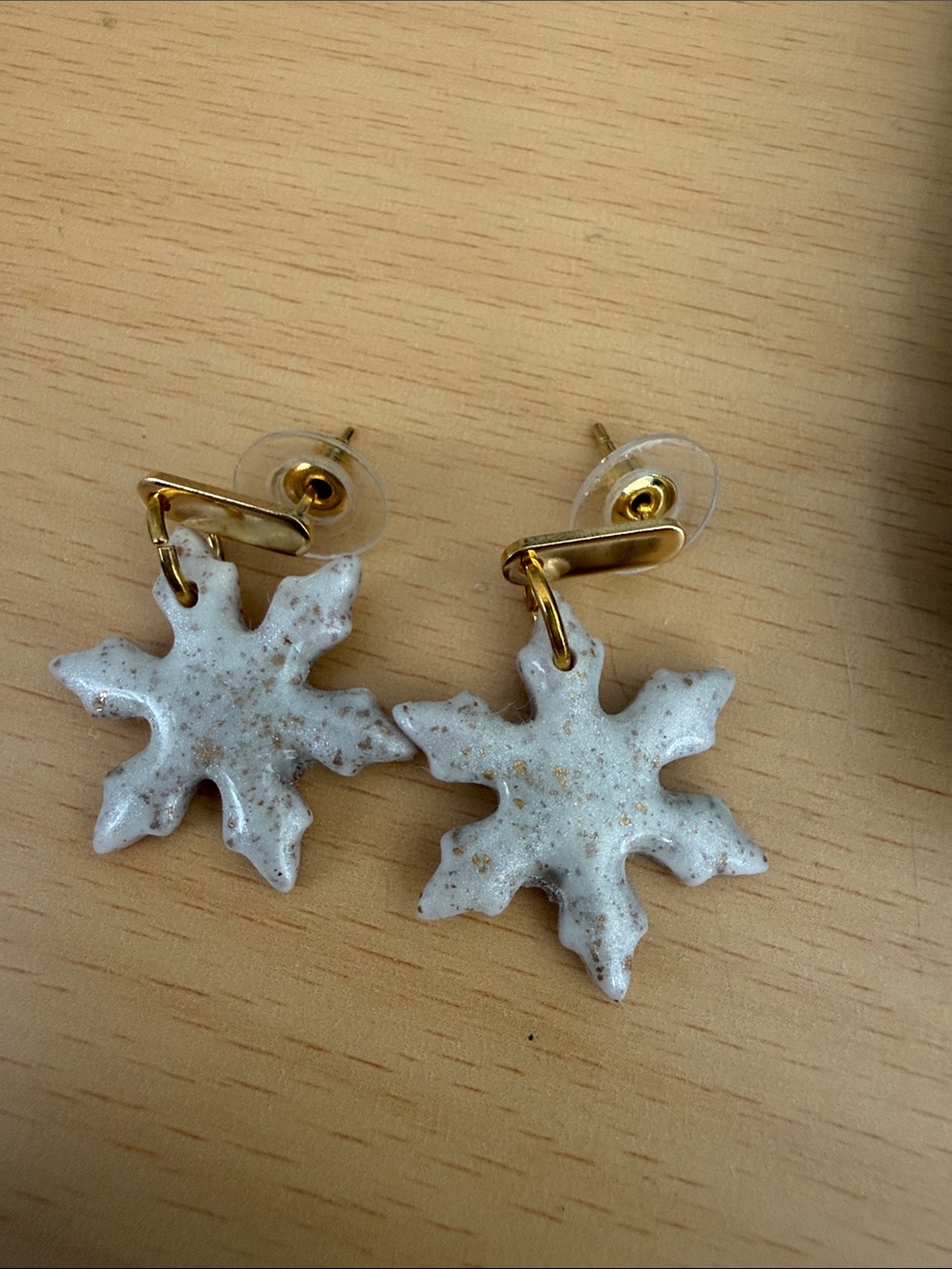 White Snowflake Drop Earrings with Gold Accents